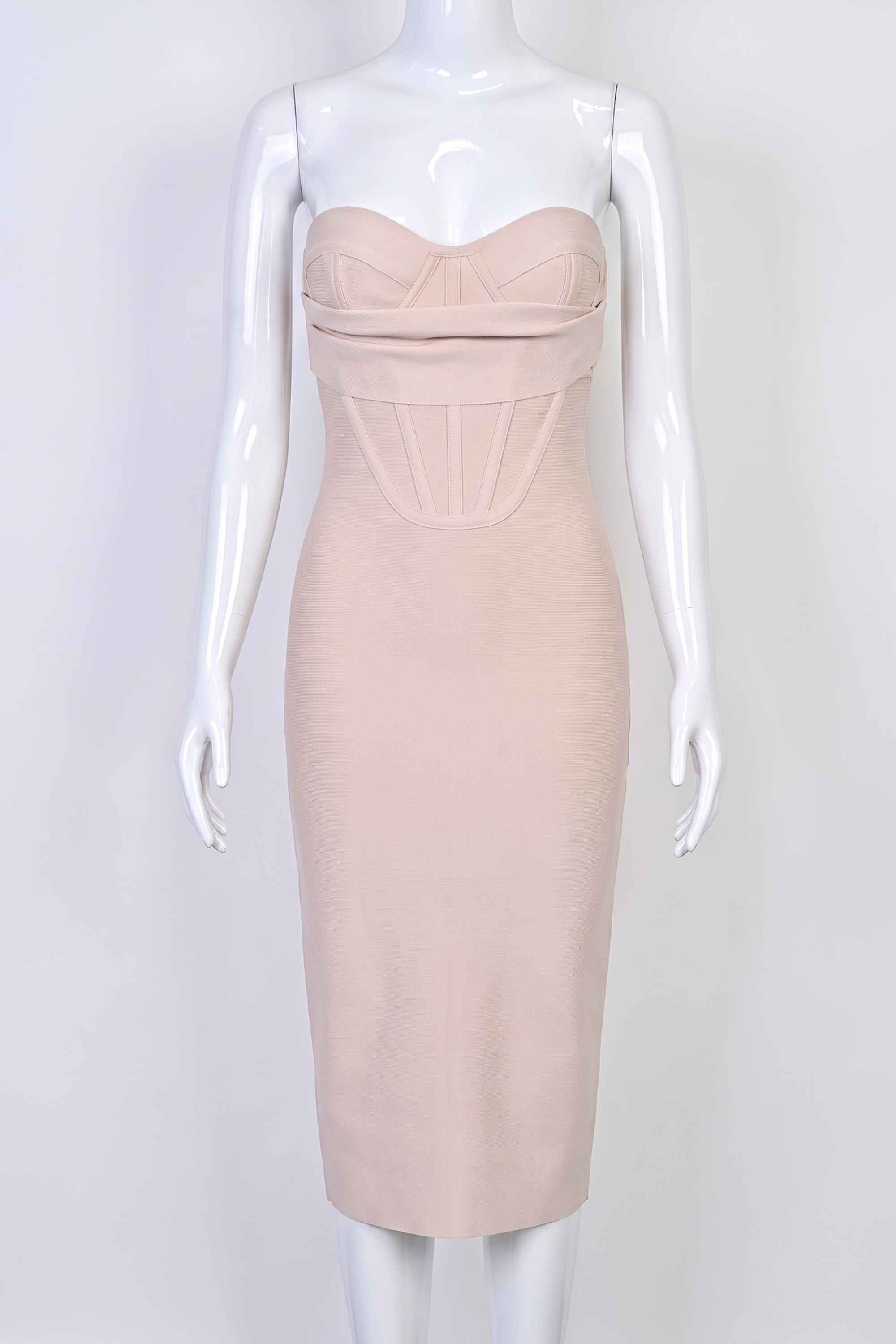 Woman wearing a figure flattering  Miles Bodycon Midi Dress - Nude BODYCON COLLECTION