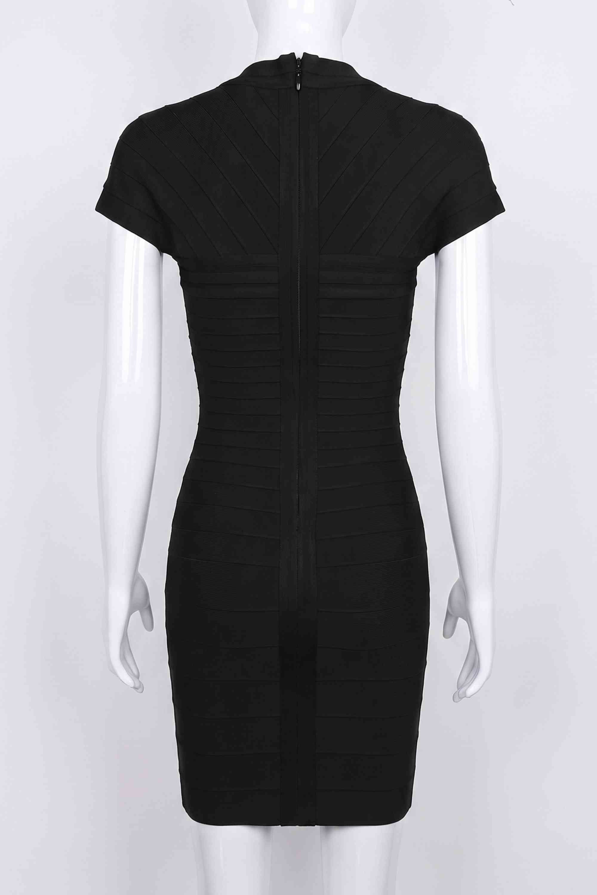 Woman wearing a figure flattering  Miranda Bandage Mini Dress - Classic Black Bodycon Collection