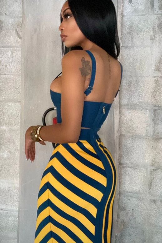 Woman wearing a figure flattering  Nadia Bandage Crop Top and Midi Skirt Set - Royal Blue BODYCON COLLECTION