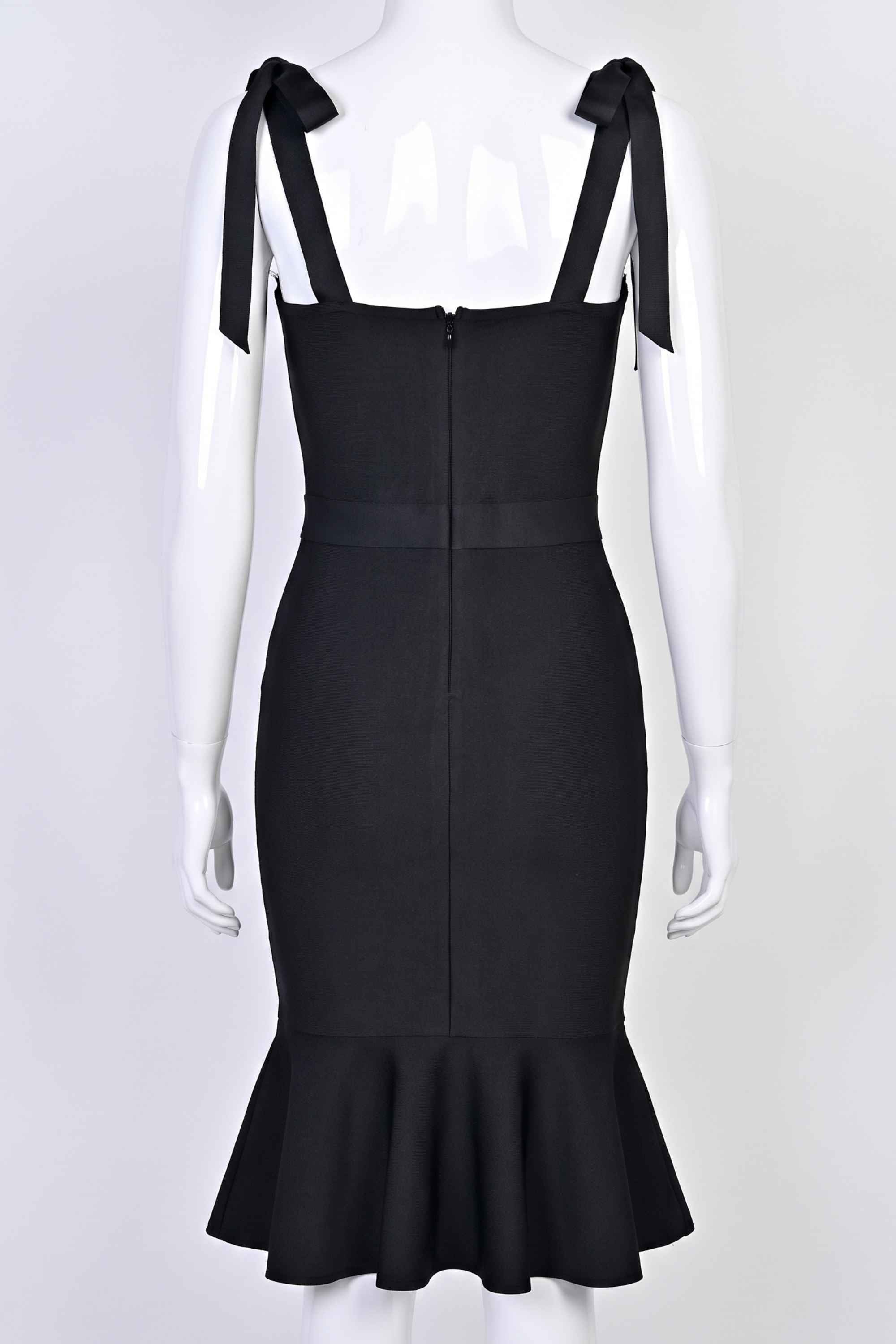 Woman wearing a figure flattering  Nora Bandage Midi Dress - Classic Black BODYCON COLLECTION