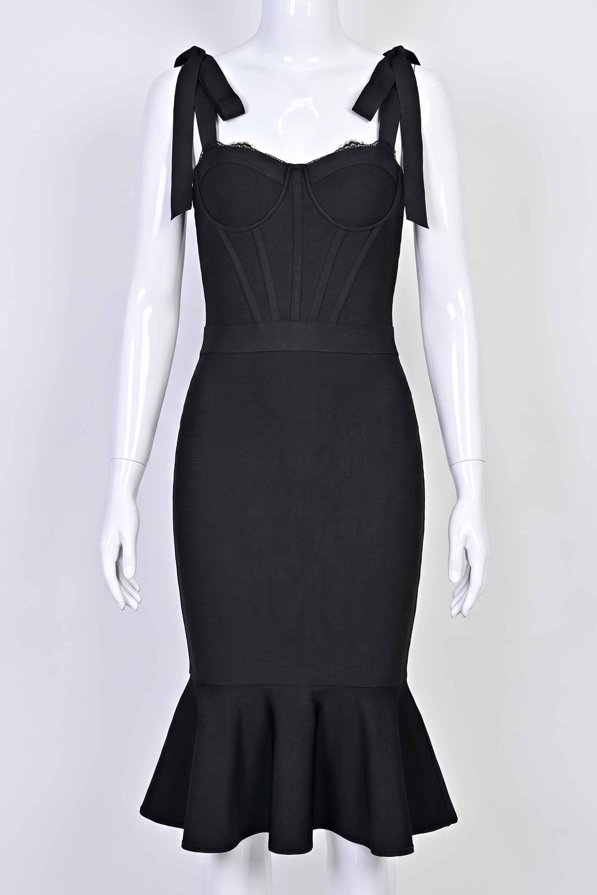 Woman wearing a figure flattering  Nora Bandage Midi Dress - Classic Black BODYCON COLLECTION