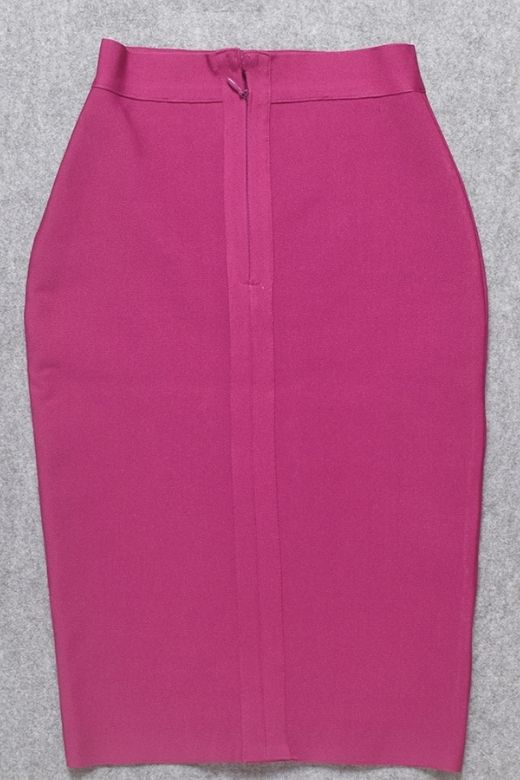 Woman wearing a figure flattering  Pencil High Waist Bandage Knee Length Skirt - Magenta Pink BODYCON COLLECTION