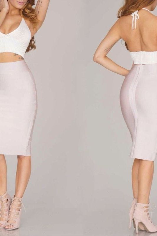 Woman wearing a figure flattering  Pencil High Waist Bandage Knee Length Skirt - Plum Purple BODYCON COLLECTION