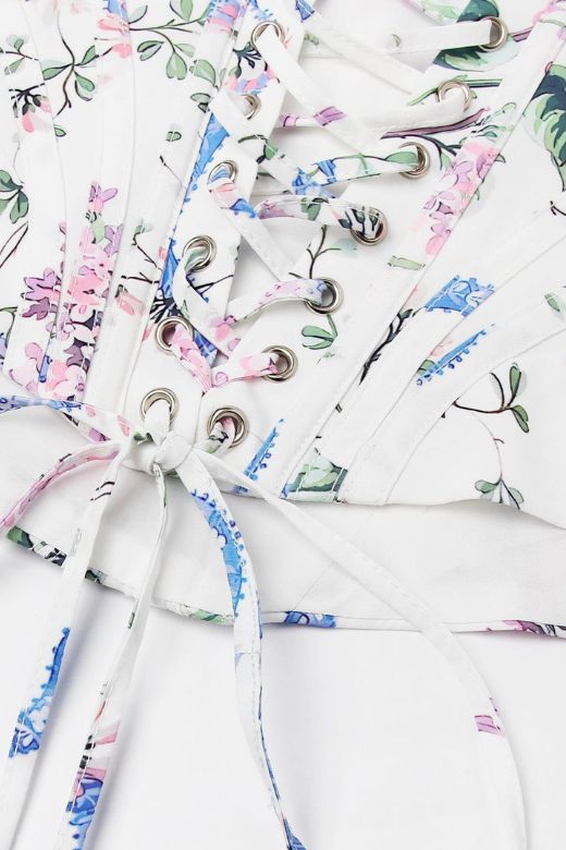 Woman wearing a figure flattering  Penny Corset Top - White Floral BODYCON COLLECTION Pty Ltd