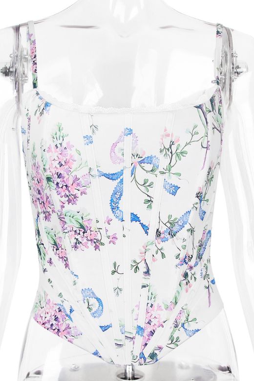 Woman wearing a figure flattering  Penny Corset Top - White Floral BODYCON COLLECTION Pty Ltd
