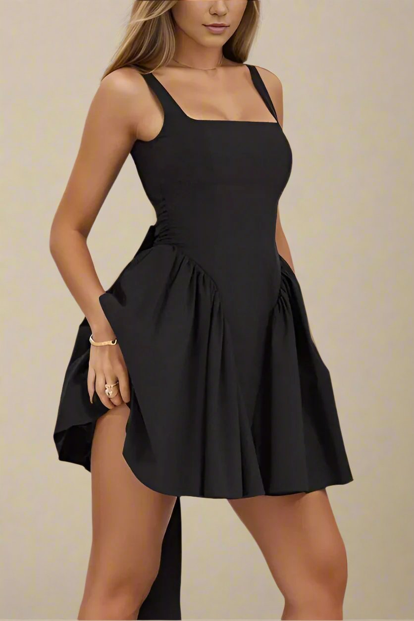 Woman wearing a figure flattering  Rian Bodycon Mini Dress - Classic Black BODYCON COLLECTION