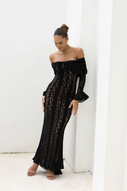 Woman wearing a figure flattering  Rose Long Sleeve Bodycon Maxi Dress - Classic Black BODYCON COLLECTION