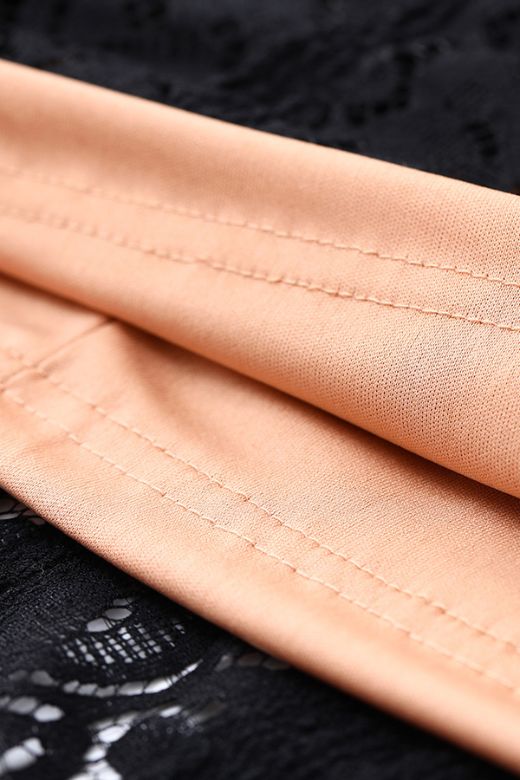 Woman wearing a figure flattering  Rose Long Sleeve Bodycon Mini Dress - Classic Black BODYCON COLLECTION