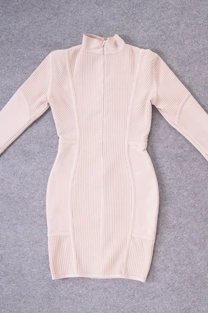 Woman wearing a figure flattering  Roxie Long Sleeve Bodycon Mini Dress - Cream Bodycon Collection