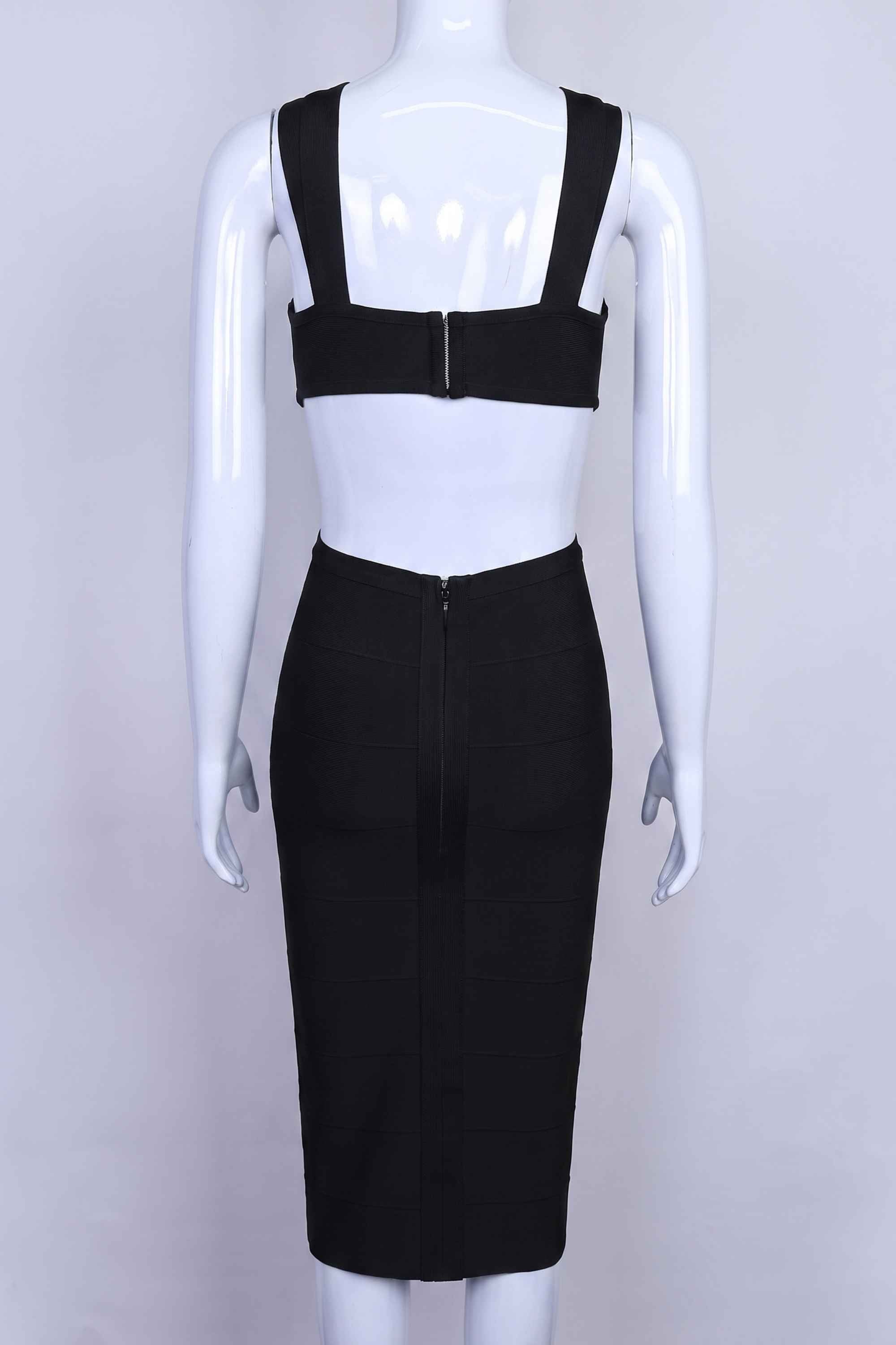 Woman wearing a figure flattering  Sasha Bandage Midi Dress - Classic Black BODYCON COLLECTION