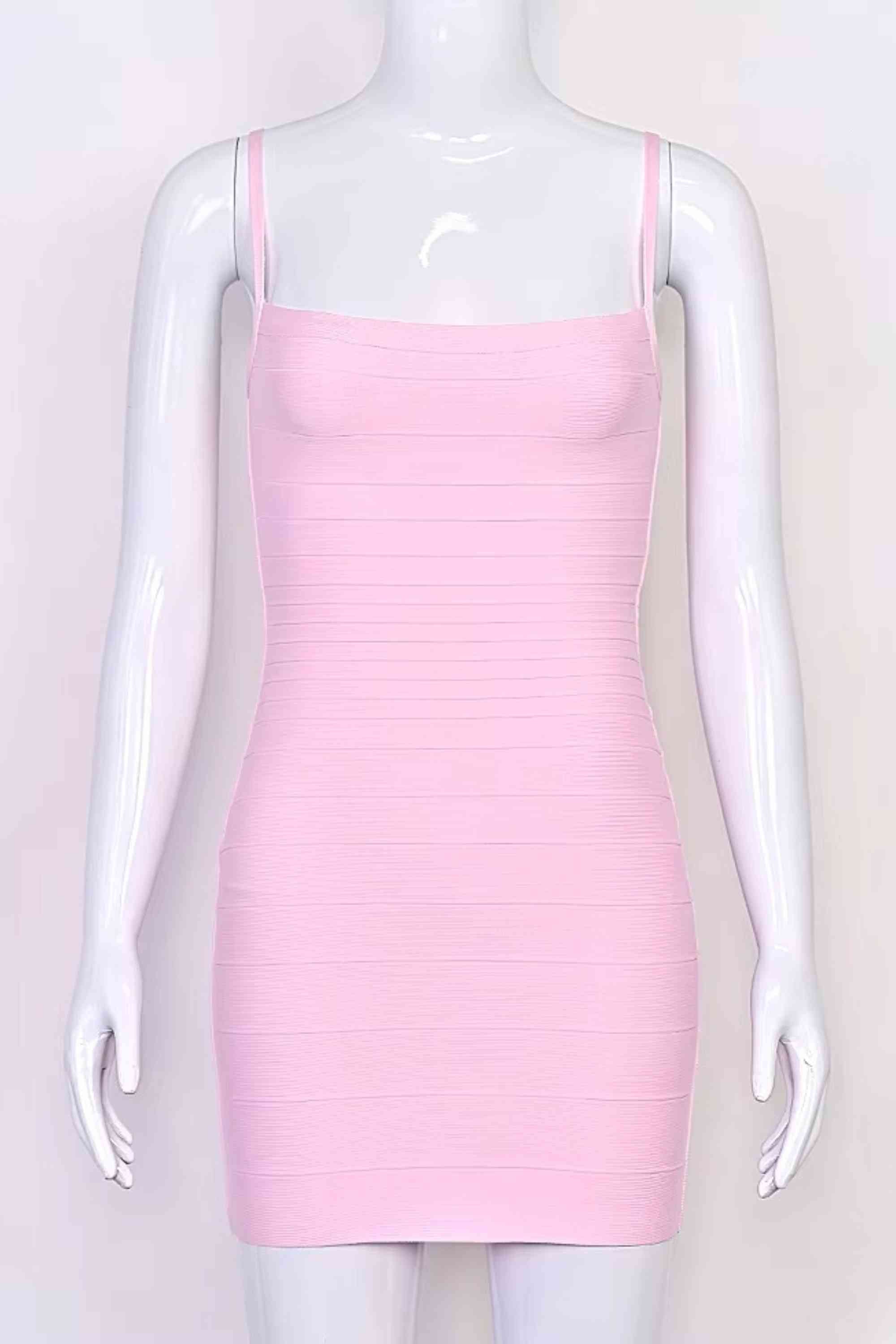 Woman wearing a figure flattering  Scarlett Bandage Mini Dress - Dusty Pink BODYCON COLLECTION Pty Ltd