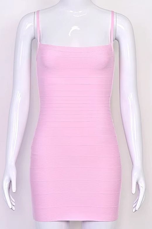 Woman wearing a figure flattering  Scarlett Bandage Mini Dress - Dusty Pink BODYCON COLLECTION Pty Ltd
