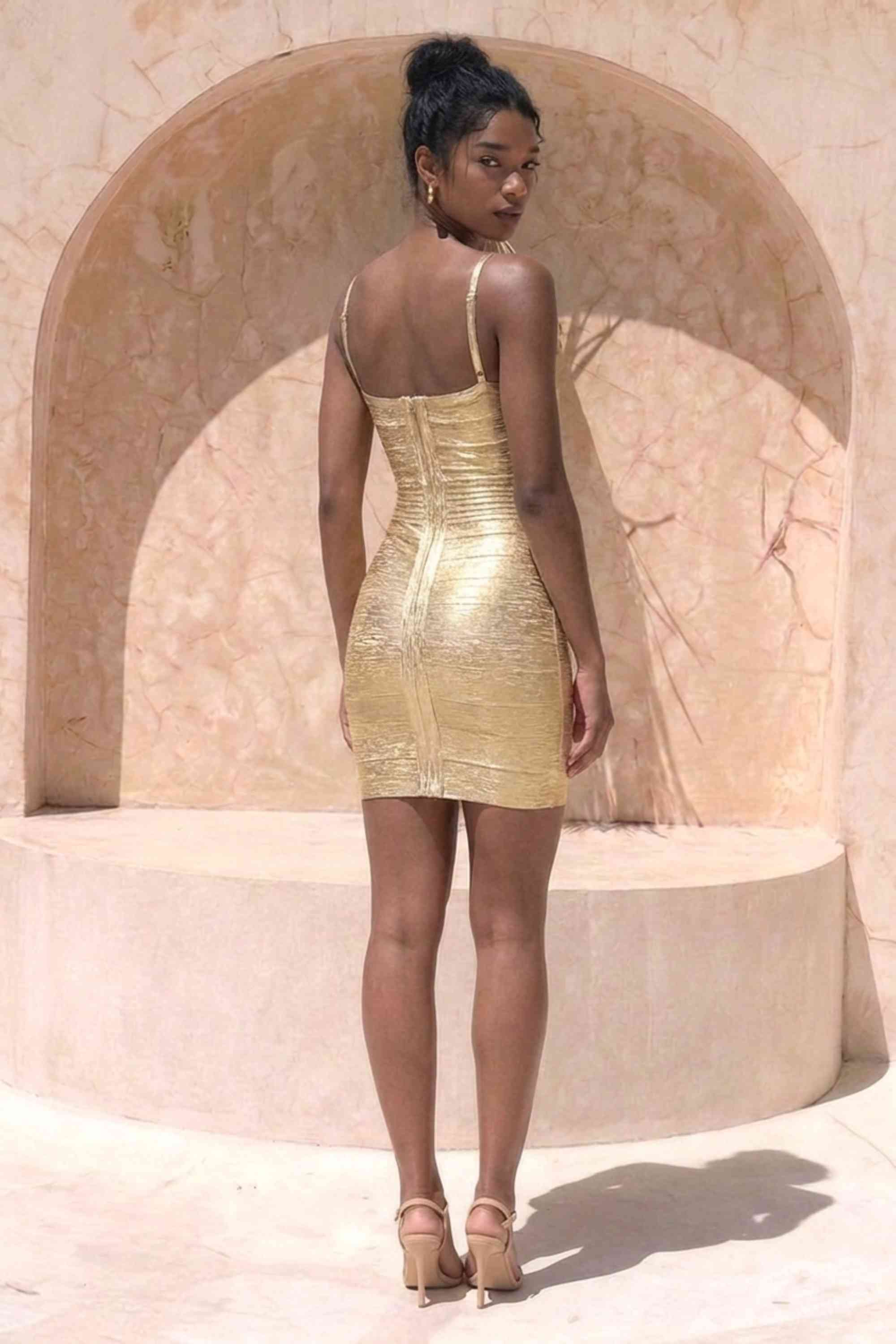 Woman wearing a figure flattering  Scarlett Bandage Mini Dress - Gold BODYCON COLLECTION Pty Ltd