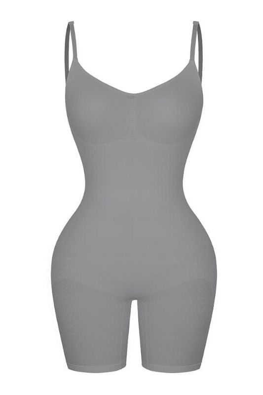 Woman wearing a figure flattering  Sculpting One Piece Bodysuit Shapewear - Mid Thigh Bodycon Collection