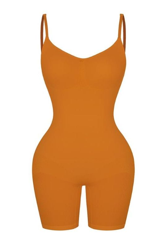 Woman wearing a figure flattering  Sculpting One Piece Bodysuit Shapewear - Mid Thigh Bodycon Collection