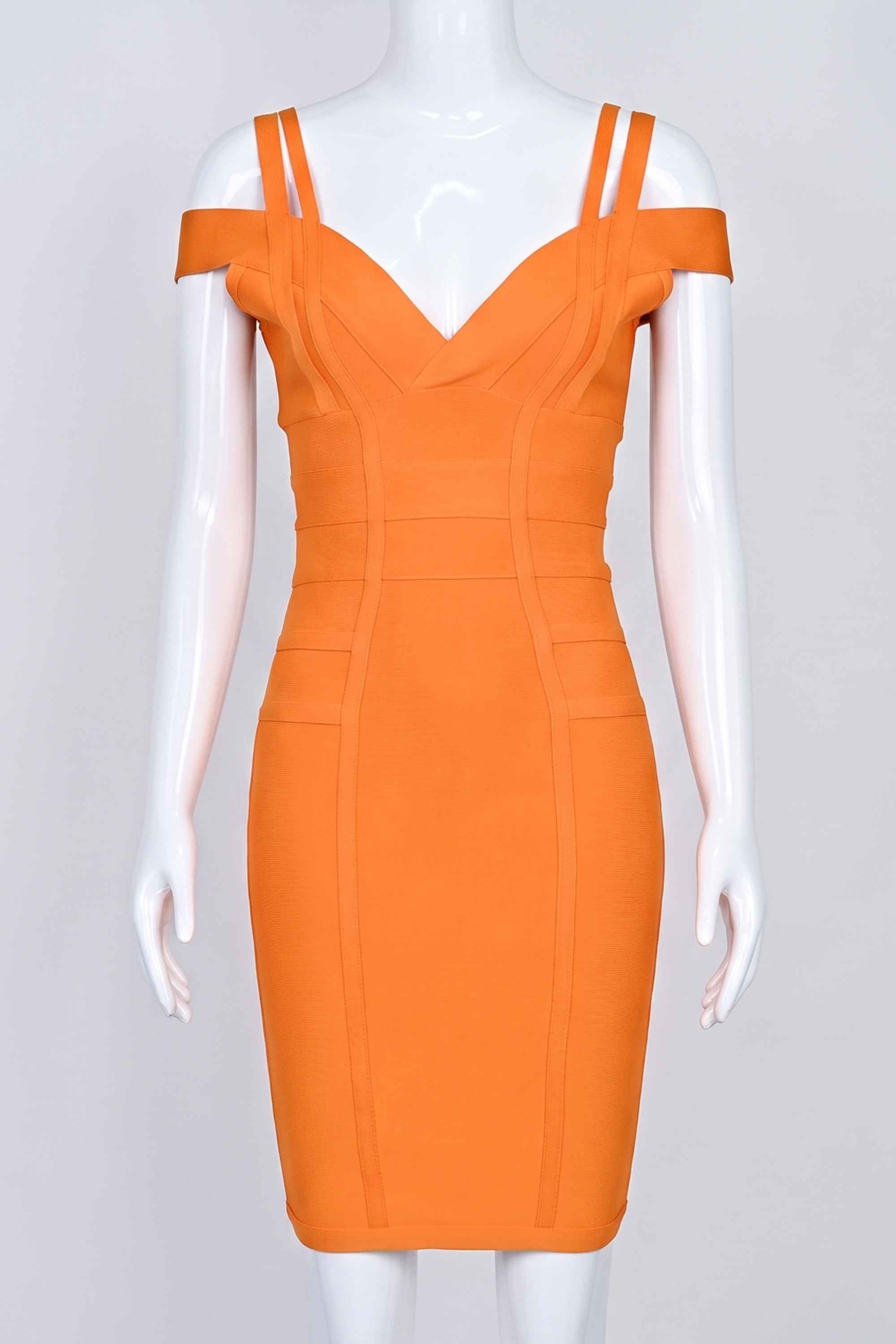 Woman wearing a figure flattering  Sia Bandage Dress - Apricot Orange Bodycon Collection