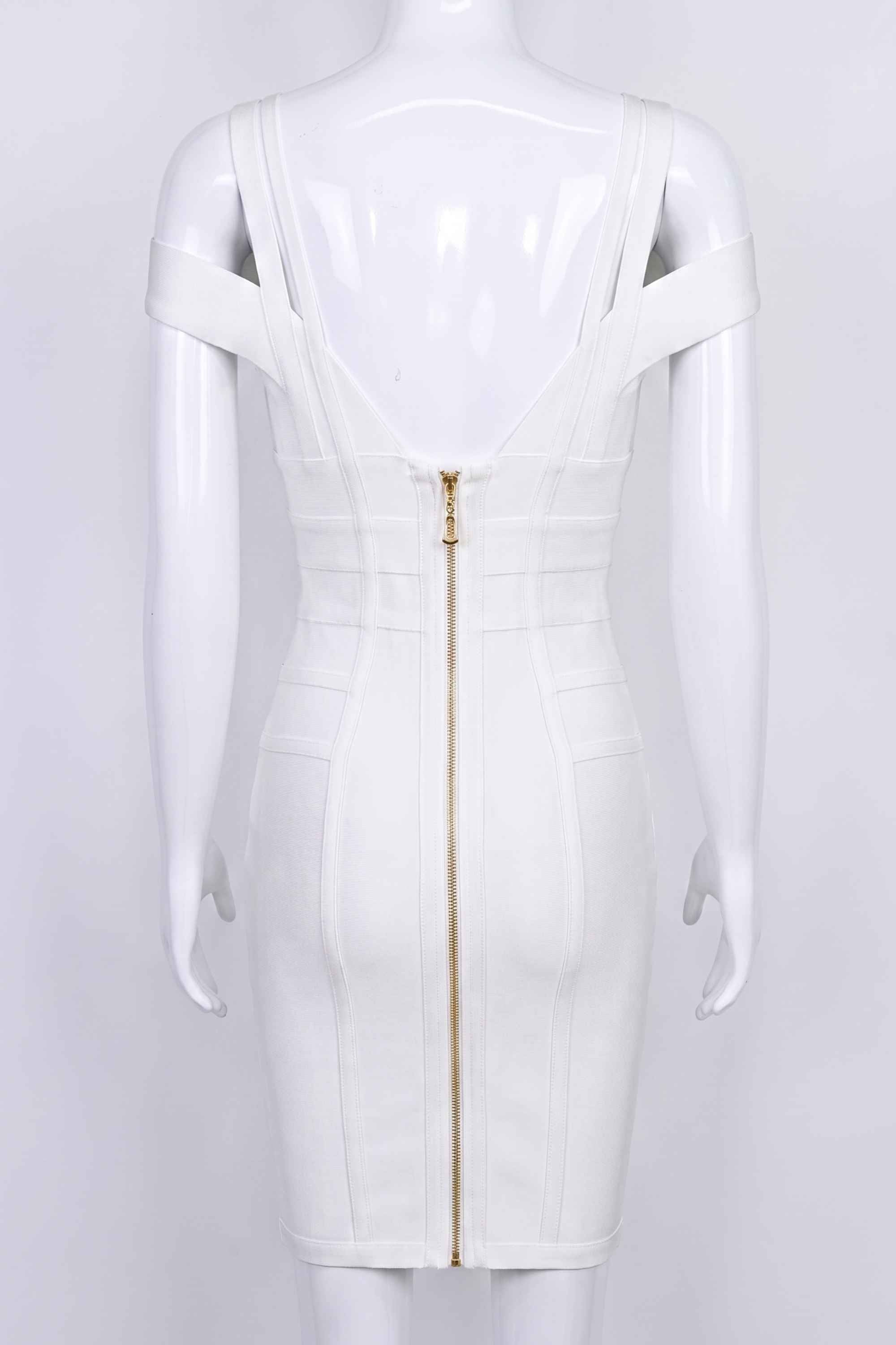 Woman wearing a figure flattering  Sia Bandage Dress - Pearl White Bodycon Collection