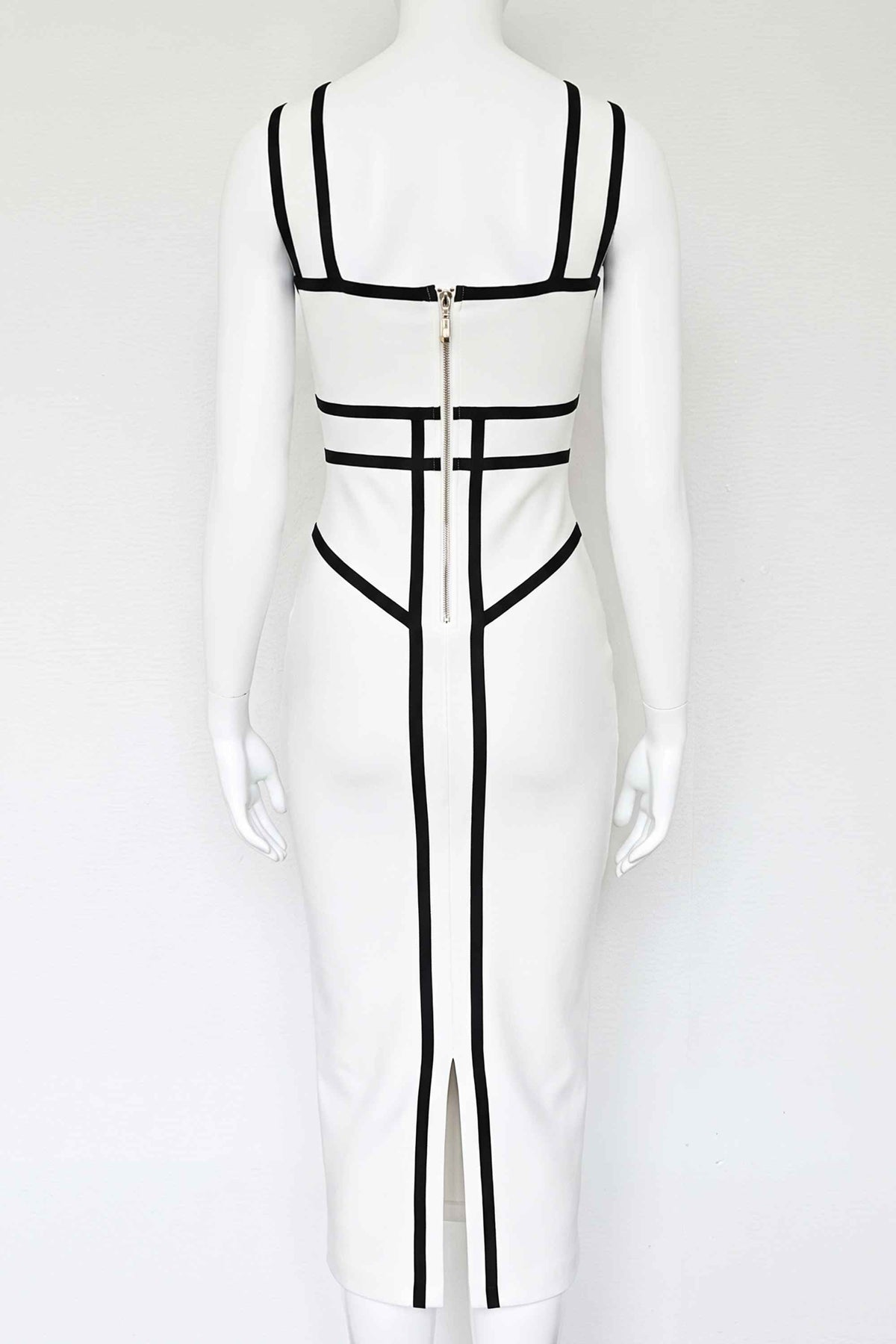 Woman wearing a figure flattering  Suki Bandage Midi Dress - White Pearl BODYCON COLLECTION