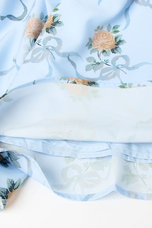 Woman wearing a figure flattering  Tasmin Bodycon Midi Dress - Sky Blue BODYCON COLLECTION