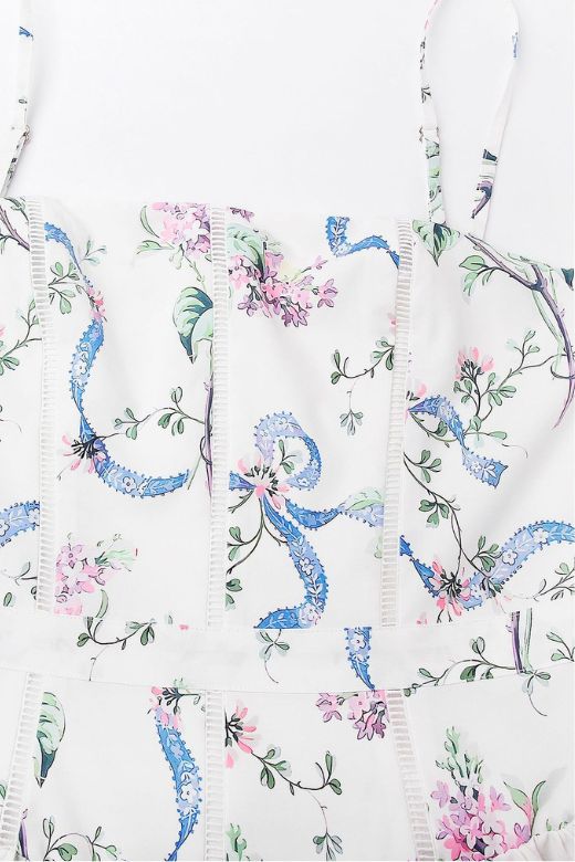 Woman wearing a figure flattering  Tasmin Bodycon Midi Dress - White Floral BODYCON COLLECTION