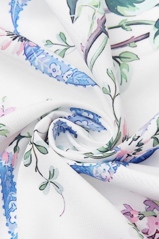 Woman wearing a figure flattering  Tasmin Bodycon Midi Dress - White Floral BODYCON COLLECTION