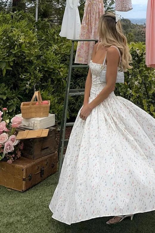 Woman wearing a figure flattering  Tasmin Bodycon Midi Dress - White Print BODYCON COLLECTION