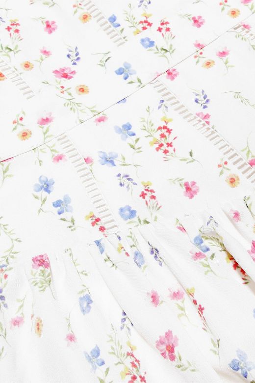 Woman wearing a figure flattering  Tasmin Bodycon Midi Dress - White Print BODYCON COLLECTION