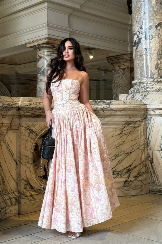 Woman wearing a figure flattering  Tasmin Midi Dress - Pink Print BODYCON COLLECTION