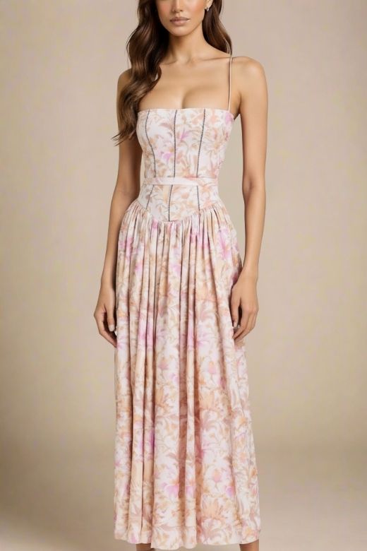 Woman wearing a figure flattering  Tasmin Midi Dress - Pink Print BODYCON COLLECTION