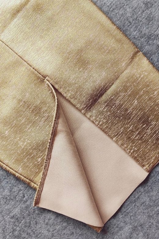 Woman wearing a figure flattering  Tyler Bodycon Dress - Gold BODYCON COLLECTION Pty Ltd