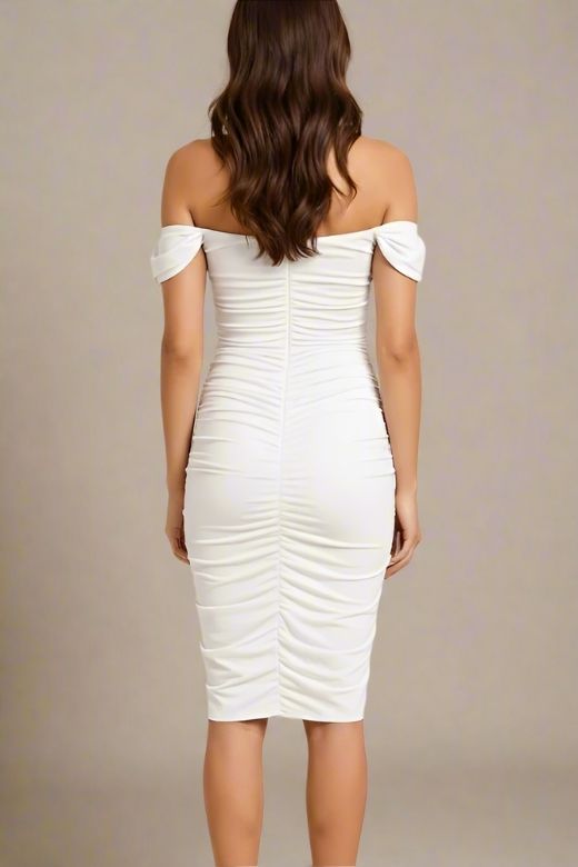 Woman wearing a figure flattering  Zia Bodycon Wrap Dress - White Pearl Bodycon Collection