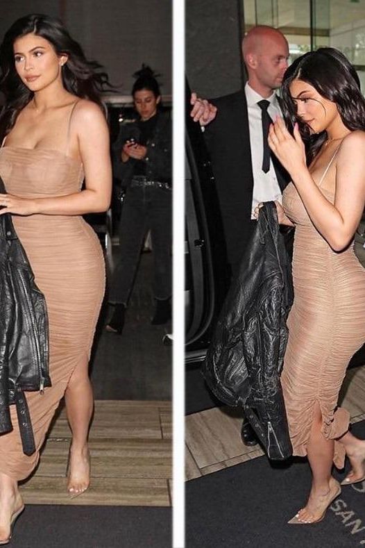 Woman wearing a figure flattering  Zoe Bodycon Wrap Maxi Dress - Tan Brown Bodycon Collection